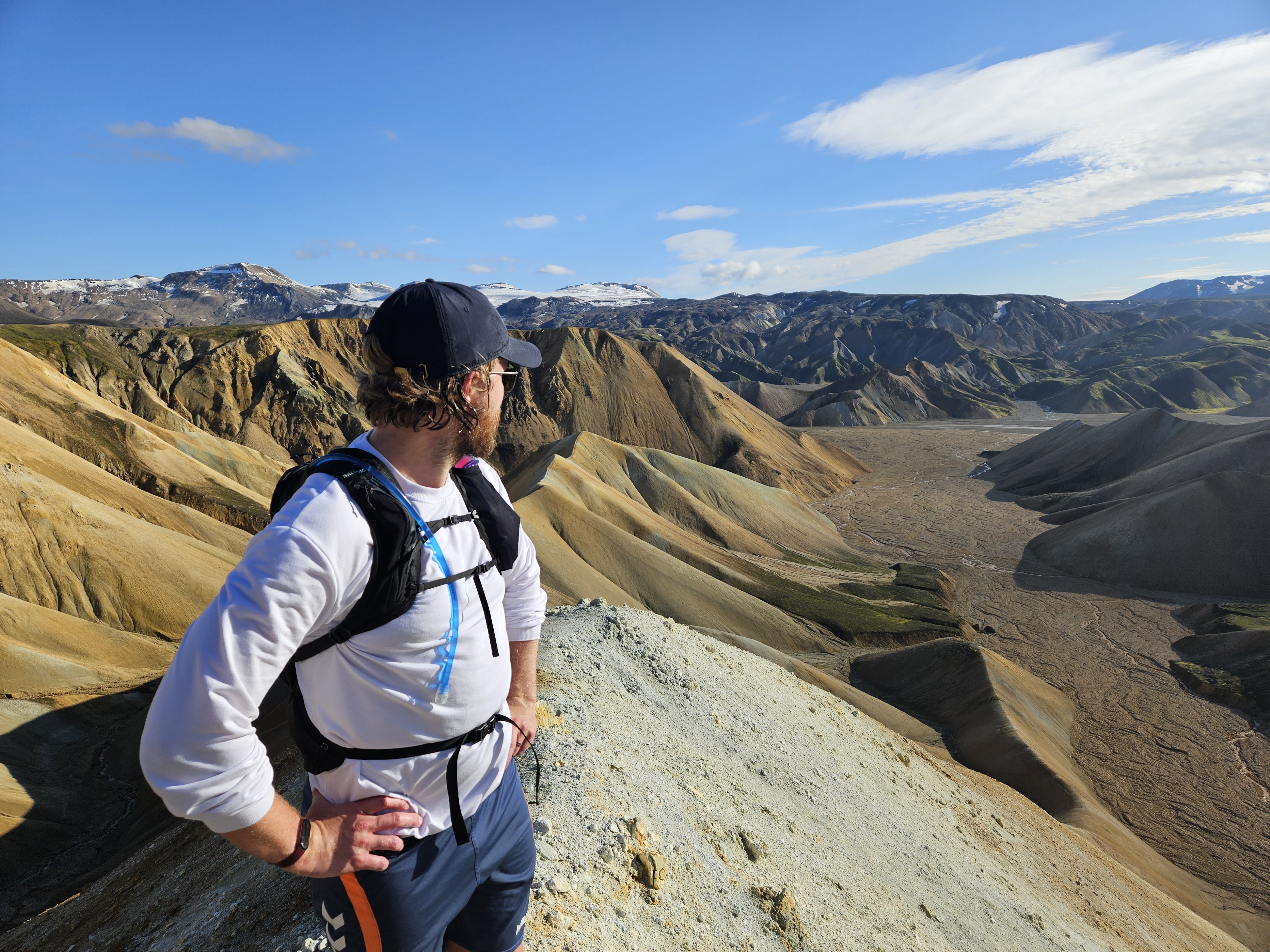 Bergur Snorrason playing an ukulele contemplatively.